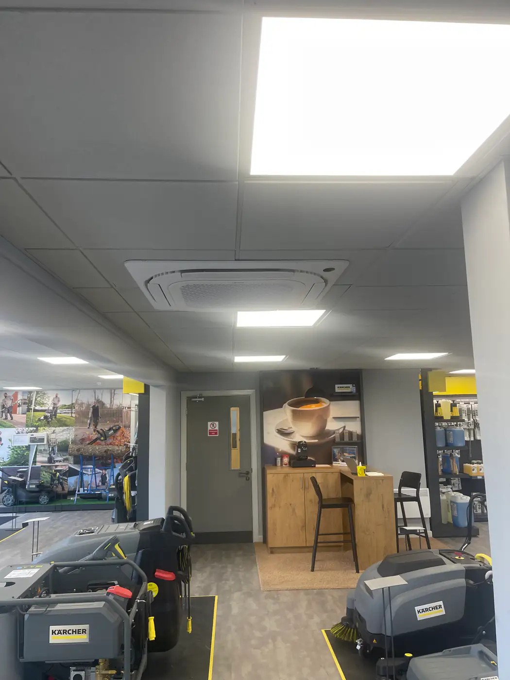 Commercial air conditioning by our Manchester engineers Four-way ceiling cassette air conditioning installed in a retail showroom